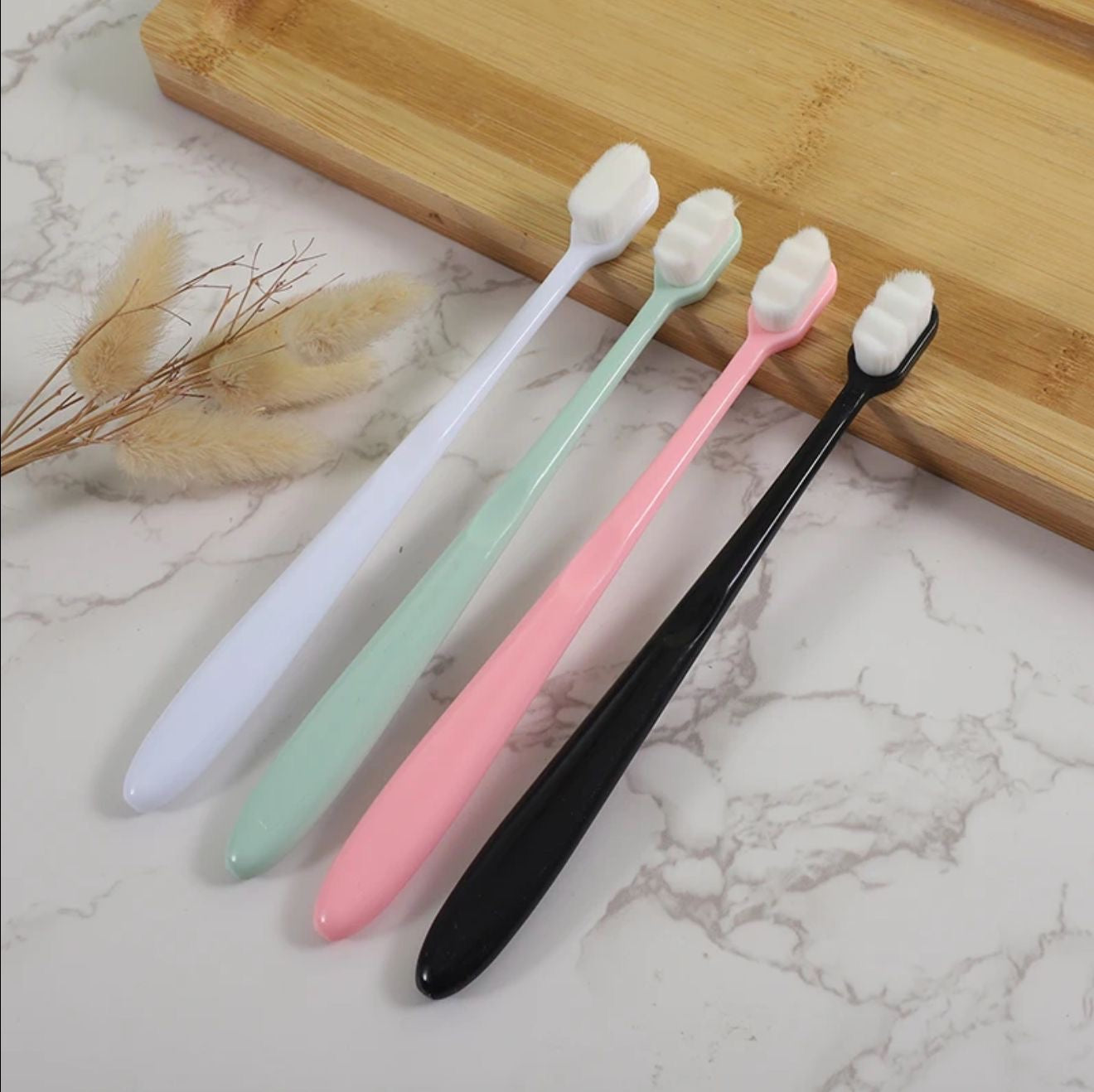 Soft bristle tooth brush