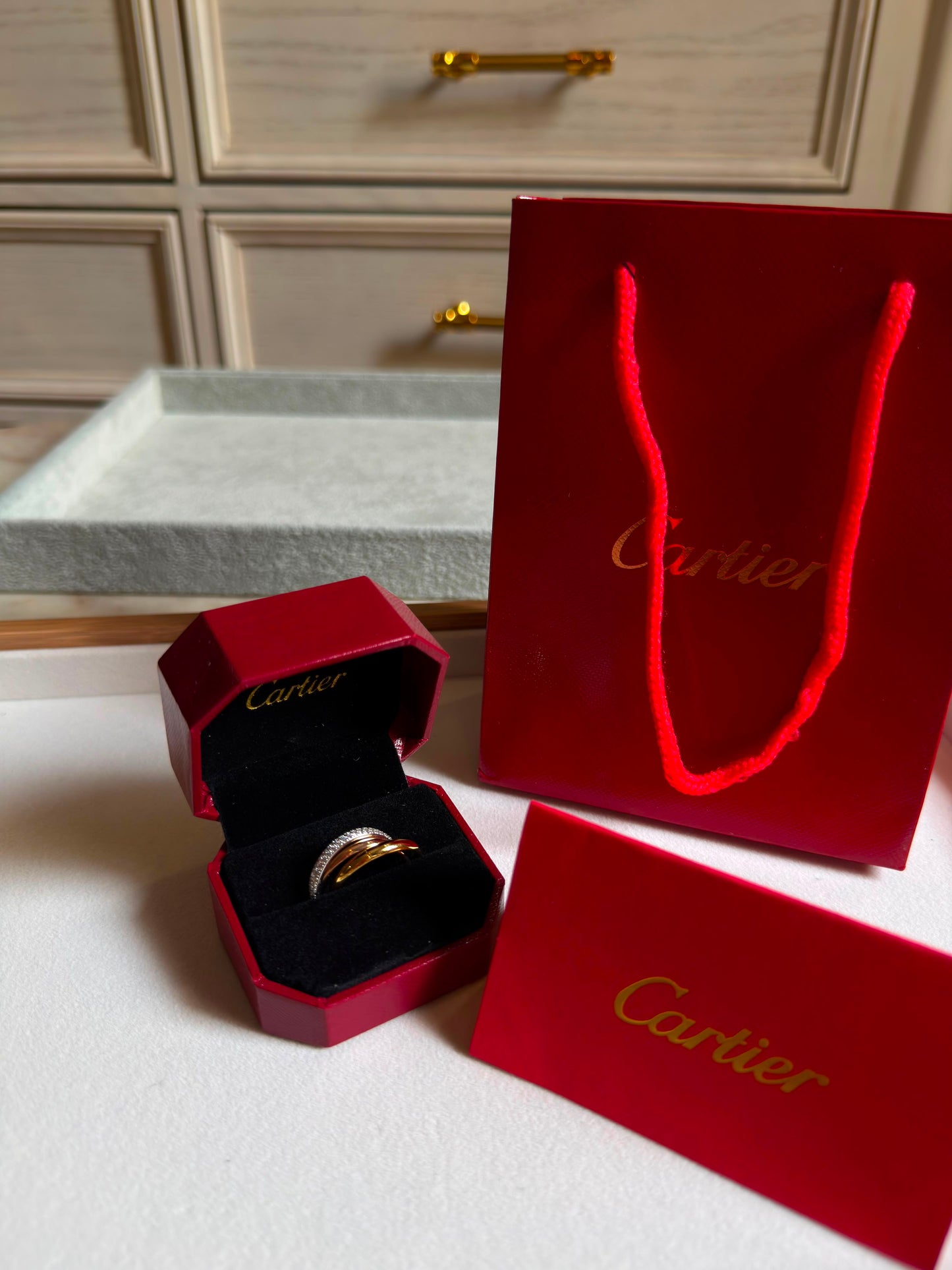 Cartier TRINITY RING, CLASSIC MODEL, HALF-PAVED ( with box & proper packaging)