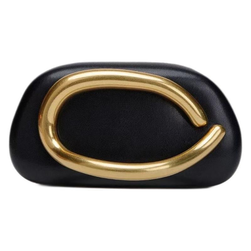 Black Zara clutch with golden fastening (own manufactured) (15 to 20 days )