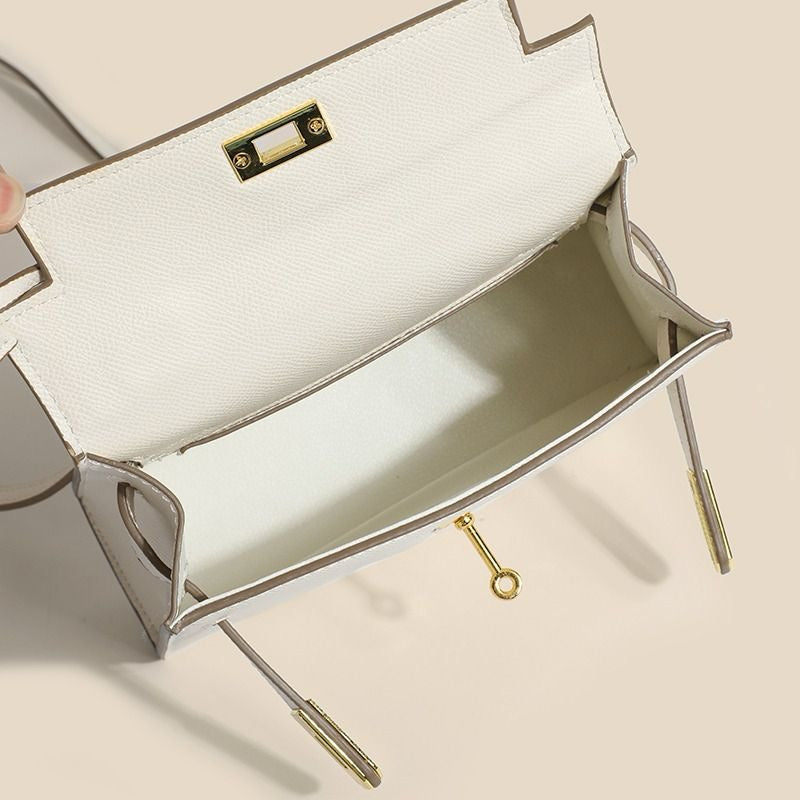 White Mini Kelly bag (available for immediate delivery)