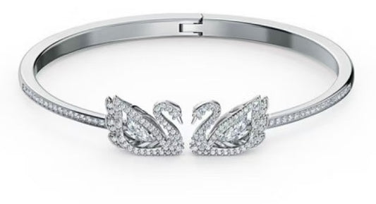 Swarovski Dancing Swan Bangle Bracelet (White Stones) – Comes in original brand packaging.