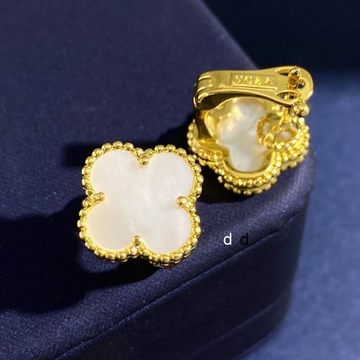 White vancleef studs