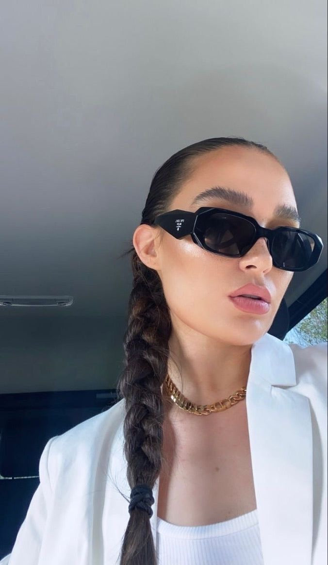 Bold frame Prada glasses