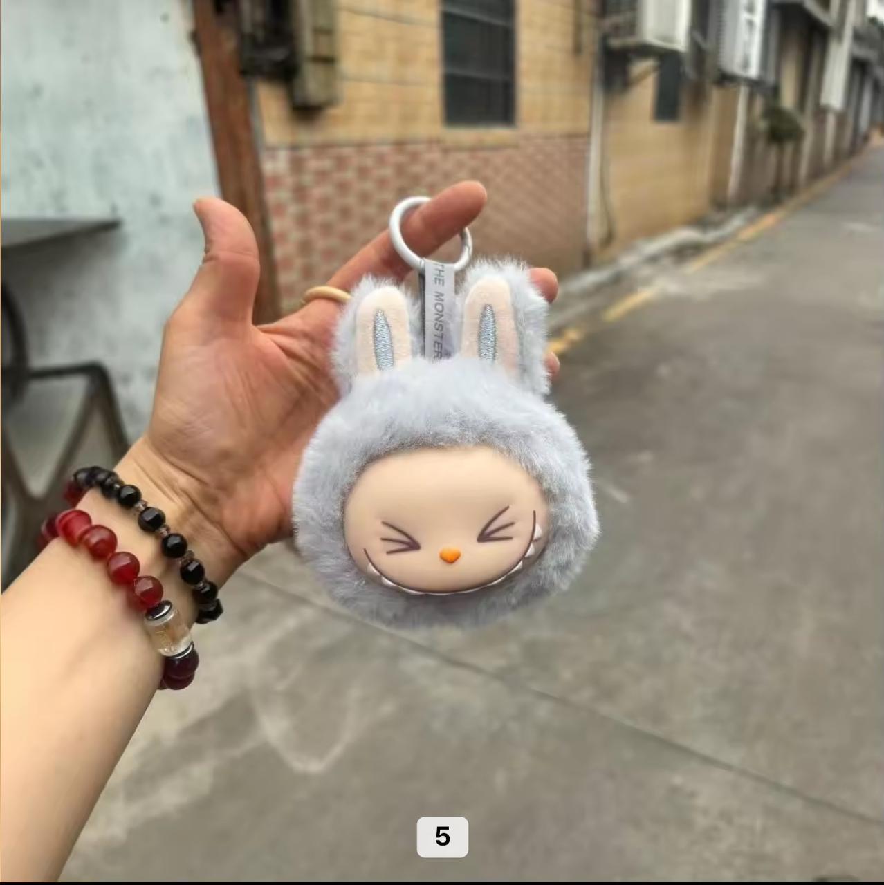 Teethe Labubu keychain charm