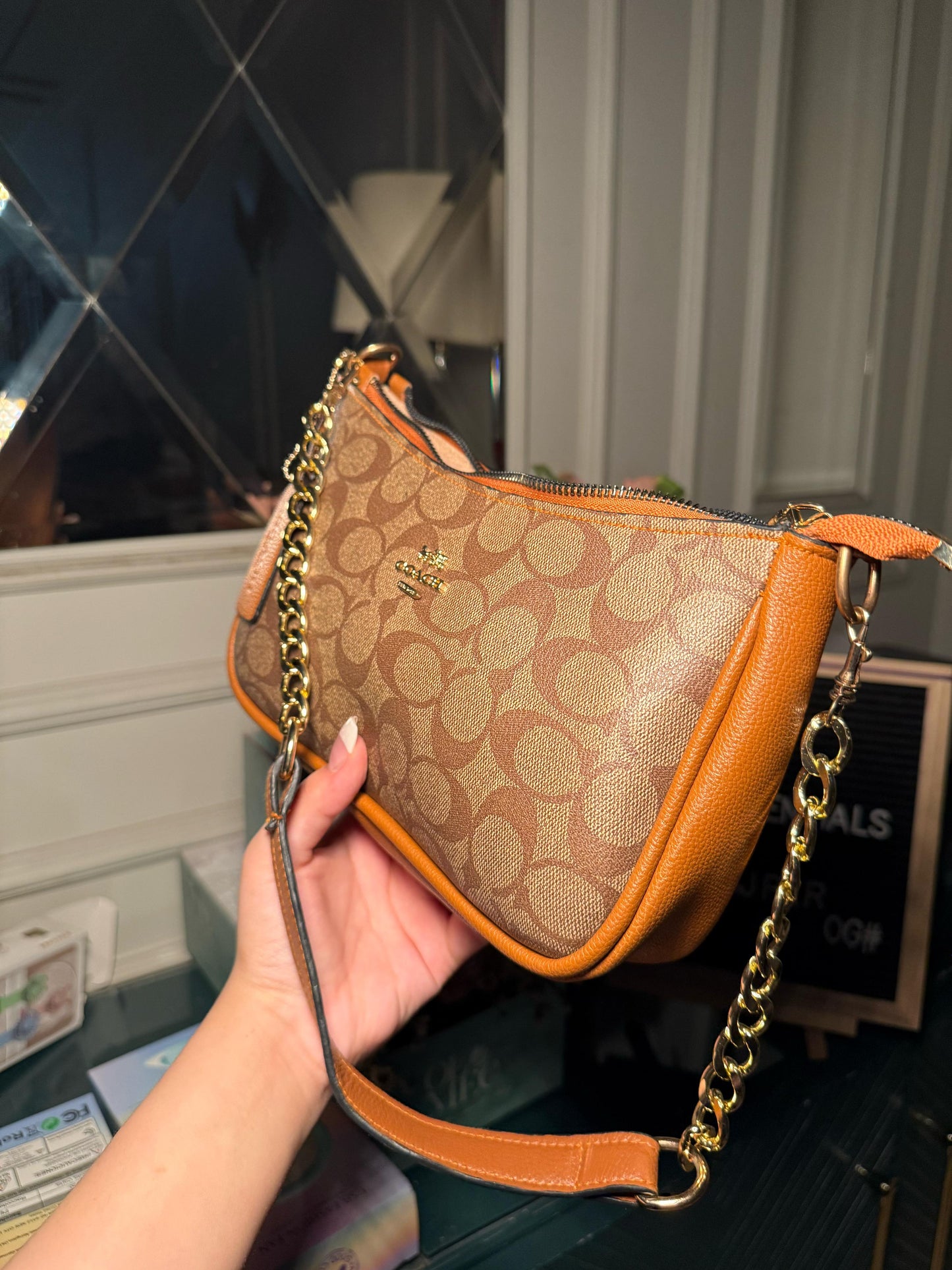 Dark brown Coach shoulder bag (in stock)