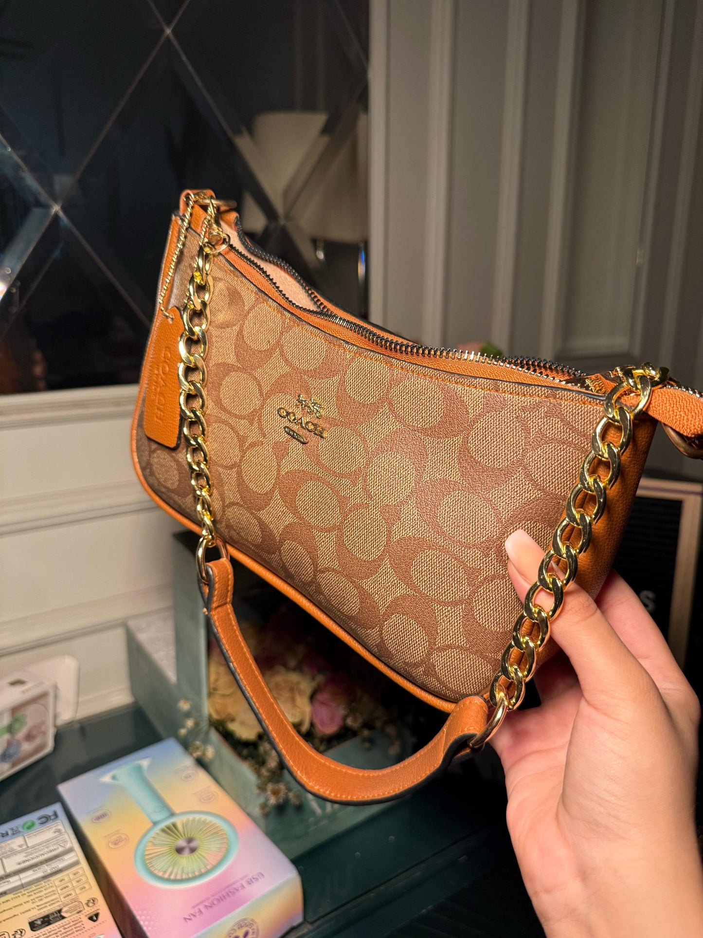 Dark brown Coach shoulder bag (in stock)