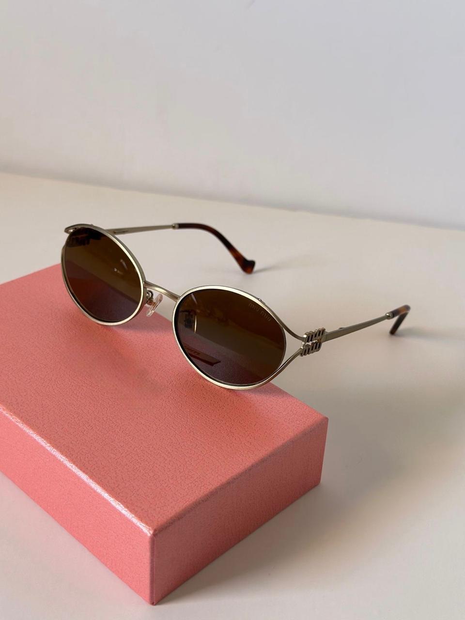 Brown shade Miu miu metal frame glasses v5