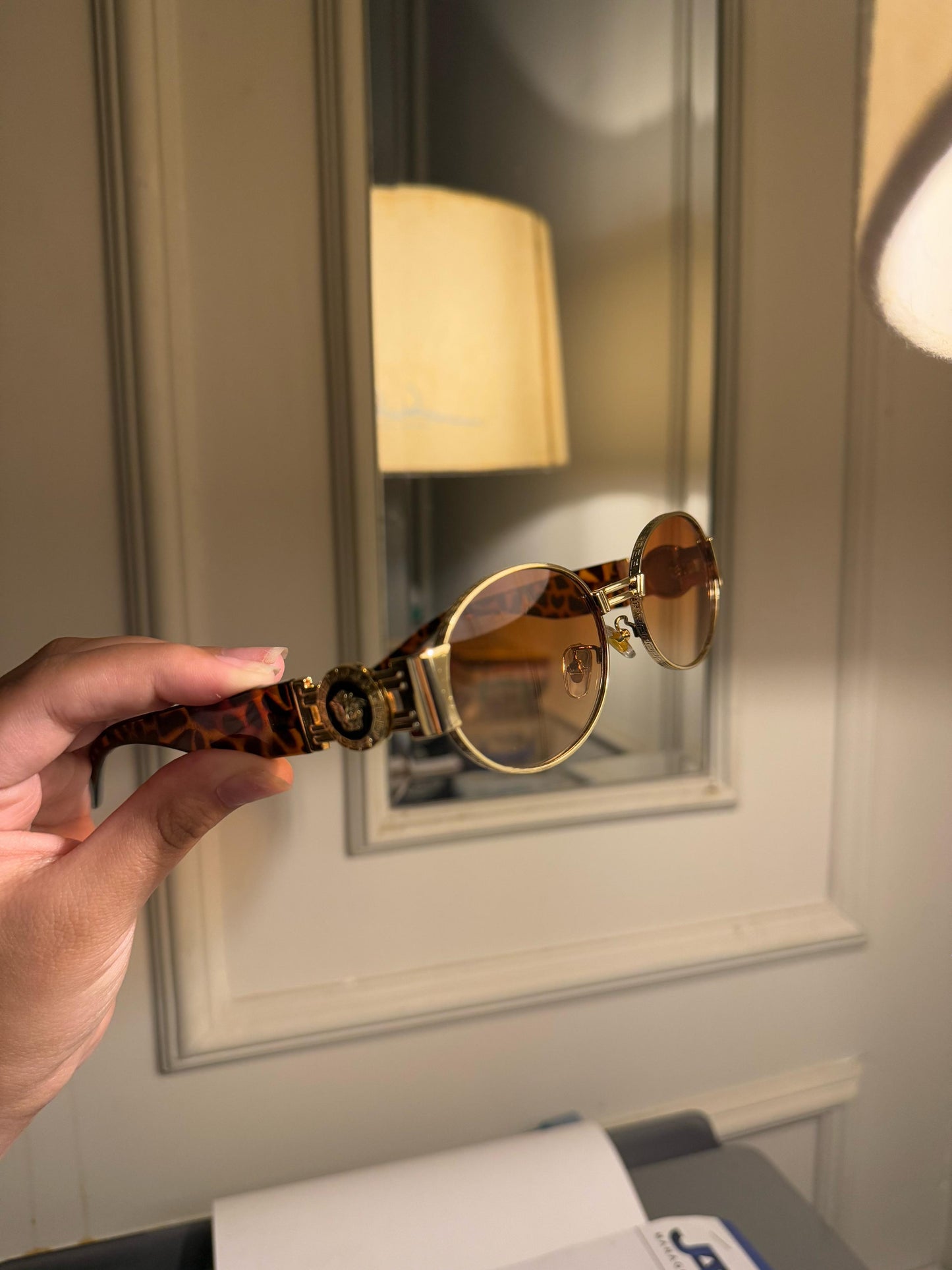 metal frame Versace glasses