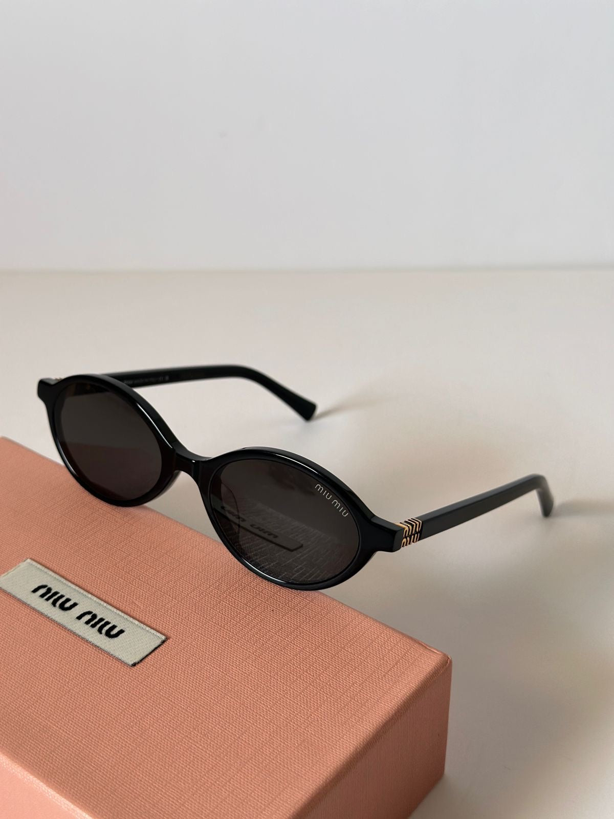 Miu Miu oval glasses
