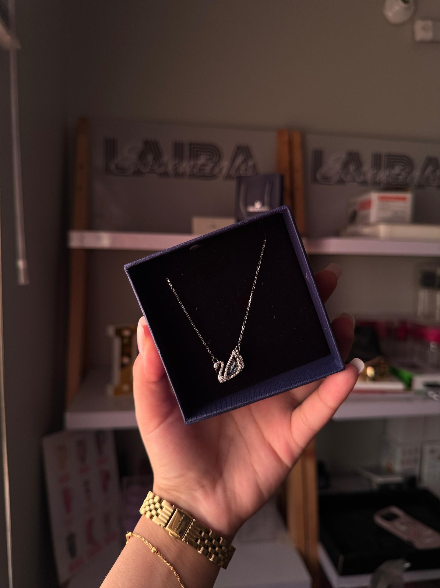 Swarovski Iconic Swan Dazzling Pendant Necklace (Blue Stone) – Comes in original brand packaging.