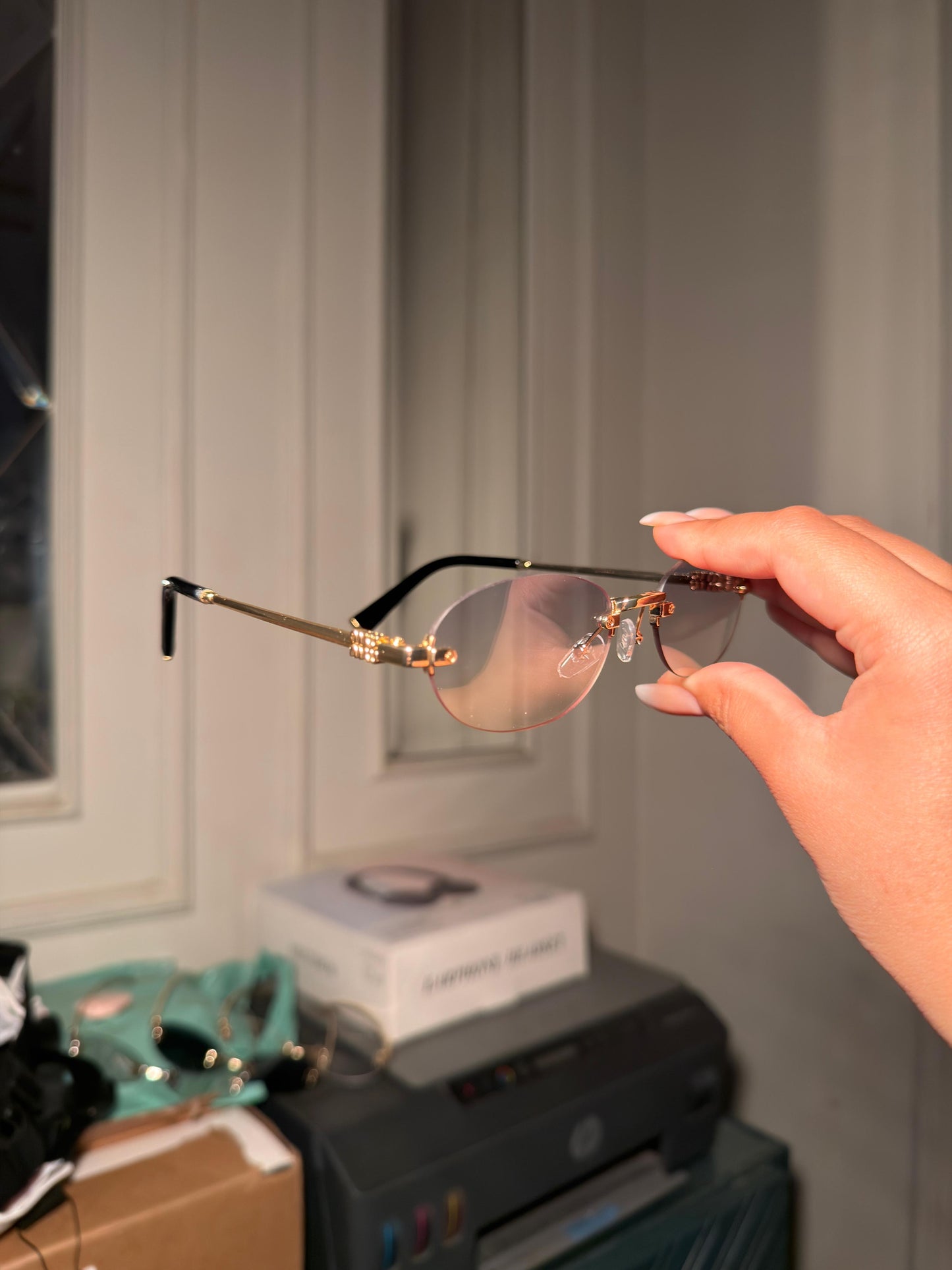 Grey MiuMiu Metal Frame Glasses