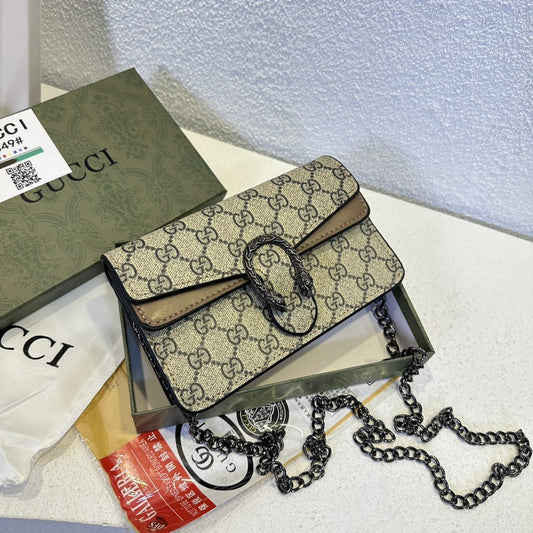 Printed Gucci Miguel studded bag