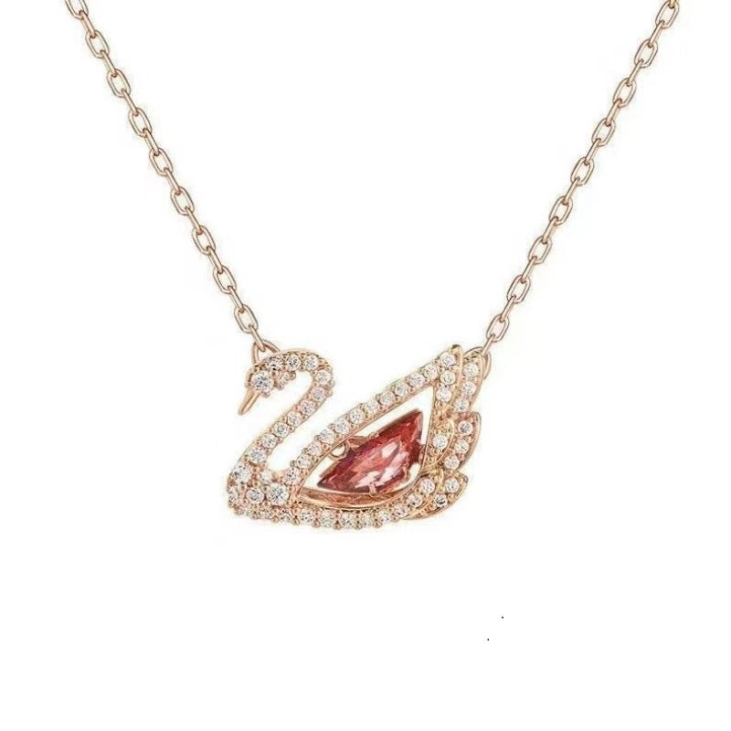 Swarovski Iconic Swan Dazzling Pendant Necklace (Rose Gold, Pink Stone) – Comes in original brand packaging.
