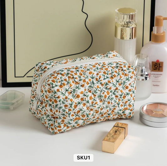 Yellow floral Essentials make up pouches v1