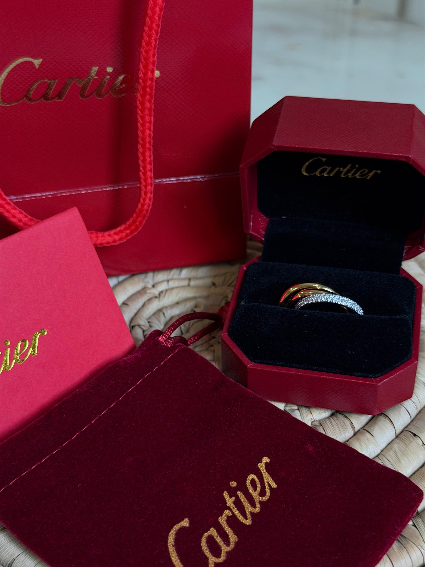 Cartier TRINITY RING, CLASSIC MODEL, HALF-PAVED ( with box & proper packaging)a
