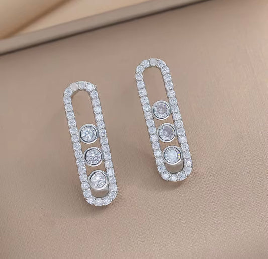 silver Messika oval frame earring