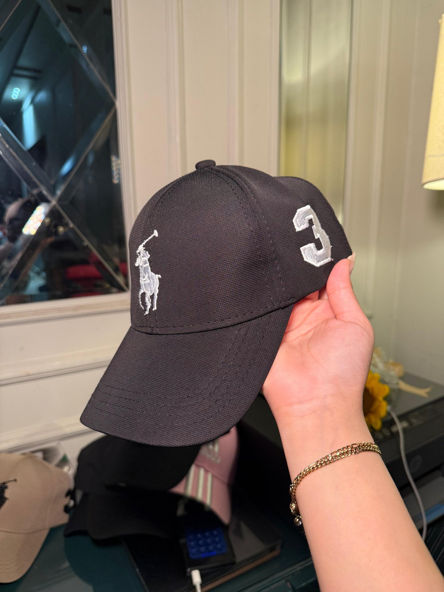 Black polo hat