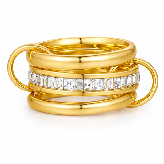 Gold link band with baguette crystals ring