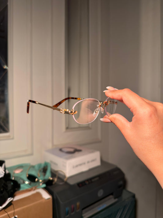 Transparent MiuMiu Metal Frame Glasses