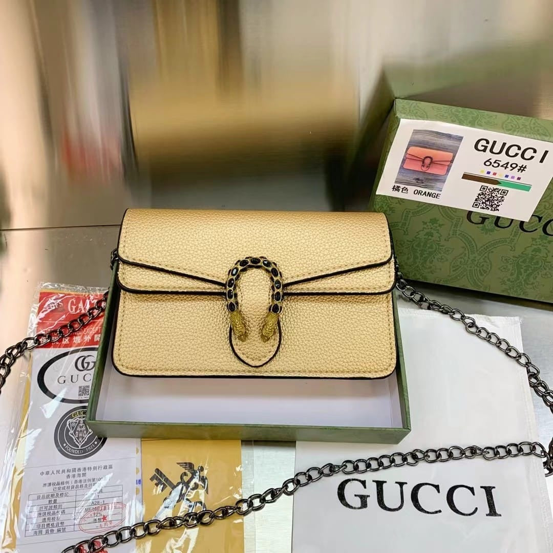 Golden Gucci Miguel studded bag