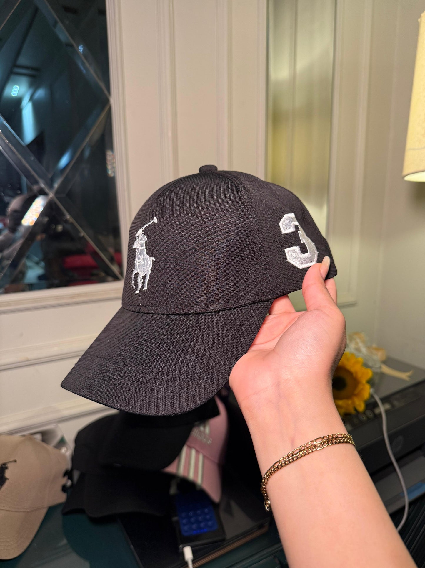 Black polo hat