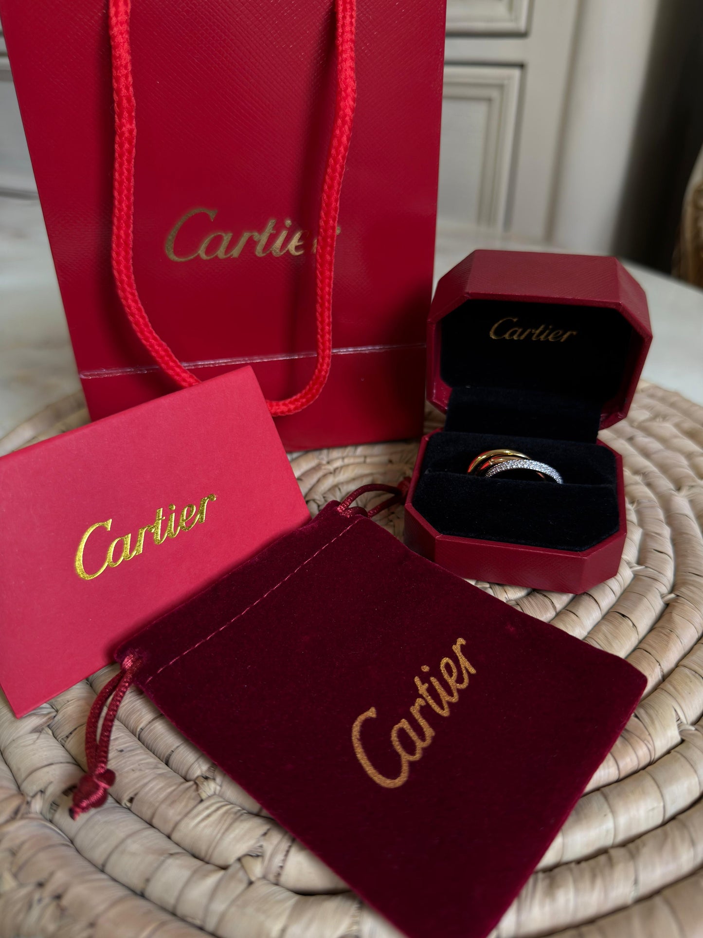 Cartier TRINITY RING, CLASSIC MODEL, HALF-PAVED ( with box & proper packaging)a