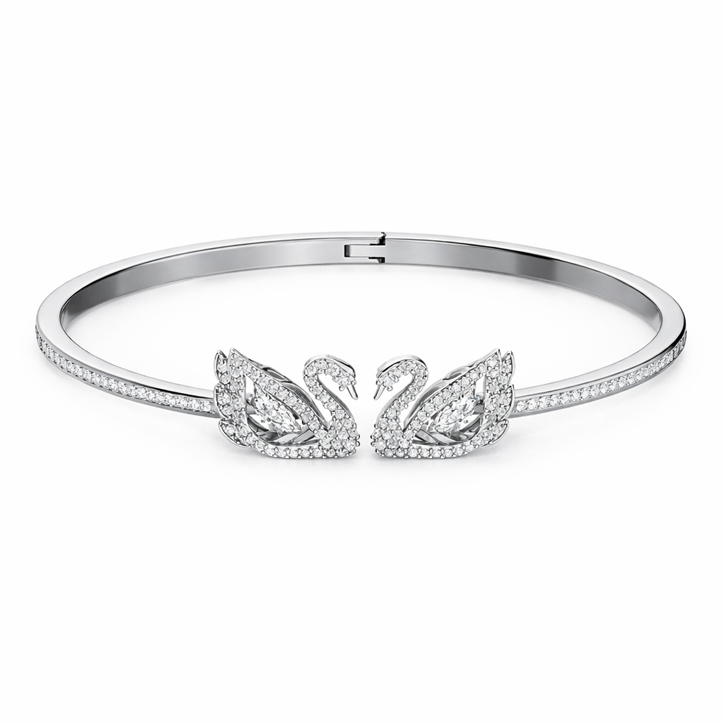 Swarovski Dancing Swan Bangle Bracelet (White Stones) – Comes in original brand packaging.