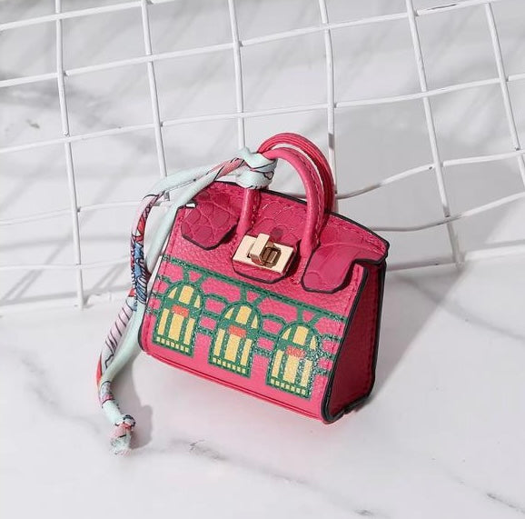 Dark pink Hermes Fauxborg Mini bag charm