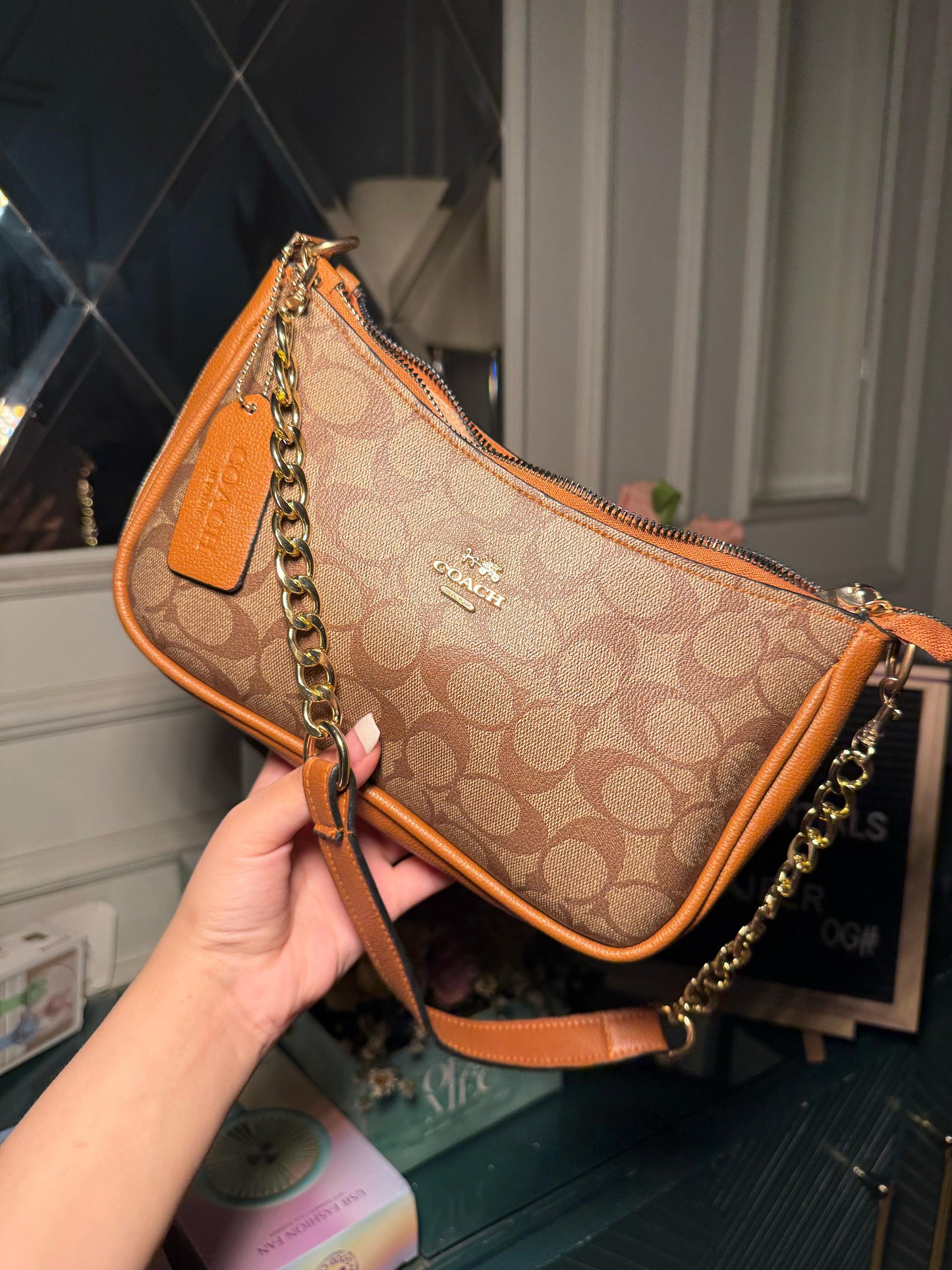 Dark brown Coach shoulder bag (in stock)