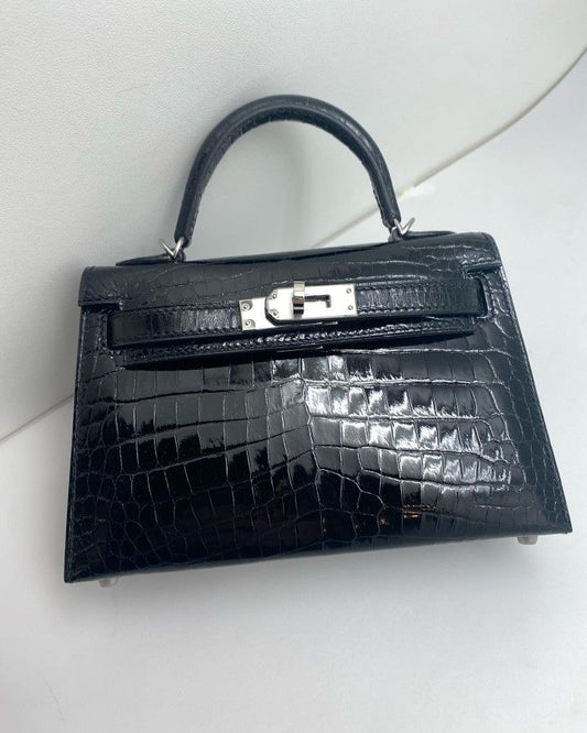 Black textured sliver hardware Mini Kelly bag